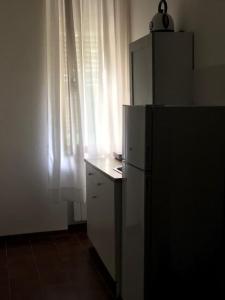 Kuchyňa alebo kuchynka v ubytovaní affittacamere alloggio olivo + 21 fotografií