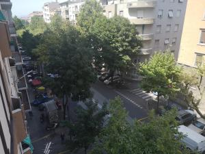 an overhead view of a city street with trees at Casa Valles in Trieste