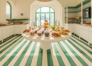 a table with food on it in a kitchen at Miramare Sea Resort & Spa in Ischia