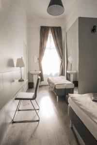 Postel nebo postele na pokoji v ubytování Ozone Private Rooms