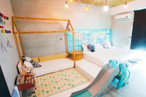 Postel nebo postele na pokoji v ubytování Noah's Ark Homestay + 37 fotografií