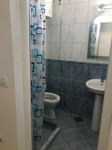 Koupelna v ubytování Tina Rooms