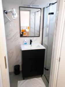 A bathroom at Evita Studio Apartment