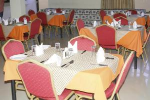 A restaurant or other place to eat at Briston Hotel