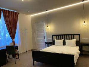 Boutique Rooms with Parking客房内的一张或多张床位