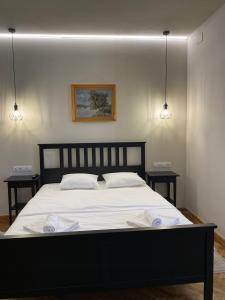 Boutique Rooms with Parking客房内的一张或多张床位