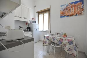 Кухня или мини-кухня в Le Fontane di Roma
