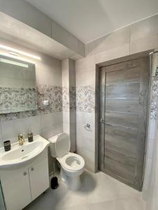 Ванна кімната в Apartament Livia