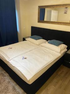 Łóżko lub łóżka w pokoju w obiekcie Hotel Restaurant Hesch