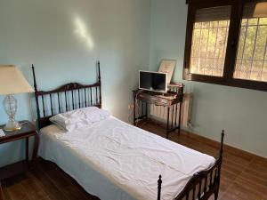 Posteľ alebo postele v izbe v ubytovaní Chalet Dani con parcela privada a 8min de Puy Du Fou