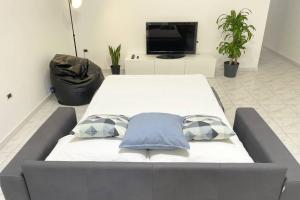 Cama o camas de una habitación en Suitcasehouse Private Apartment