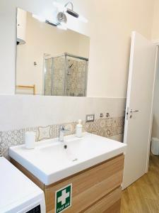 Kylpyhuone majoituspaikassa Guini Dream Apartment