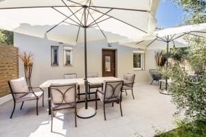 A patio or other outdoor area at Villa 4 you iliopetra
