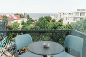 Balkón nebo terasa v ubytování NOVUS Hotel