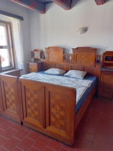 Postel nebo postele na pokoji v ubytování Renaissance Vintage Apartment A3