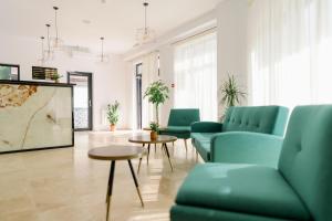 Kuchyň nebo kuchyňský kout v ubytování NOVUS Hotel