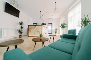 TV a/nebo společenská místnost v ubytování NOVUS Hotel