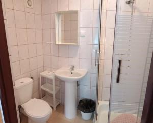 a bathroom with a toilet and a sink and a shower at DW Bukówka in Karpacz +43 photos