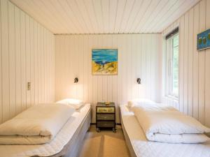 Postel nebo postele na pokoji v ubytování Holiday home Nørre Nebel LXV