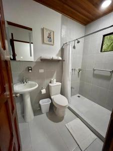 Ванная комната в Apartotel Flamboyant