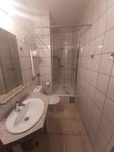 Kúpeľňa v ubytovaní Hotel Młyn