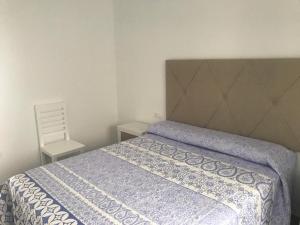 Ένα ή περισσότερα κρεβάτια σε δωμάτιο στο Buenavista Playa 1º izquierda