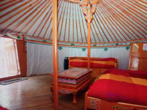 Postel nebo postele na pokoji v ubytování Camping Domaine de Mepillat