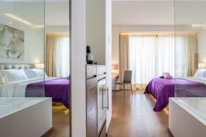 Letto o letti in una camera di O Monot Boutique Hotel Beirut