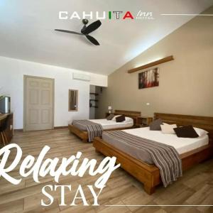 Postel nebo postele na pokoji v ubytování Cahuita Inn
