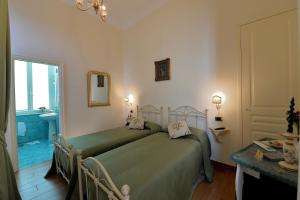Ένα ή περισσότερα κρεβάτια σε δωμάτιο στο B&B Residenza Via Dei Mille