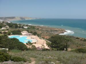 a view of a resort and the ocean at Belver Porto Dona Maria Resort in Luz