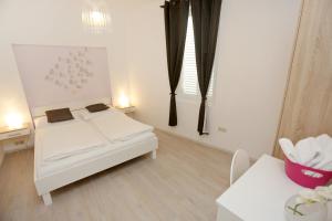 Cama o camas de una habitación en Zadar Street Apartments and Room
