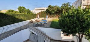 A garden outside B&B IONIO
