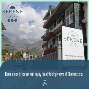a sign in front of a building with mountains in the background at SERENE SUITES in Dharamshala