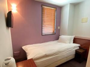 Postel nebo postele na pokoji v ubytování Web Hotel Tokyo Asakusabashi