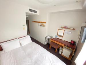 Tempat tidur dalam kamar di Web Hotel Tokyo Asakusabashi