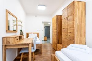 Posteľ alebo postele v izbe v ubytovaní Apartmány Resort Vrchlabí