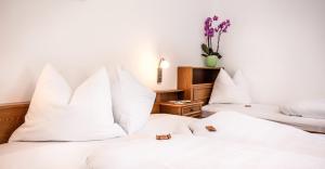 Katil atau katil-katil dalam bilik di Hotel Linde