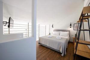 Кровать или кровати в номере AG Luxury Villas, Iraklitsa