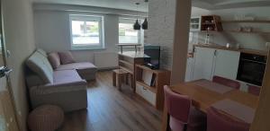 Kuchyň nebo kuchyňský kout v ubytování Apartments Vesna
