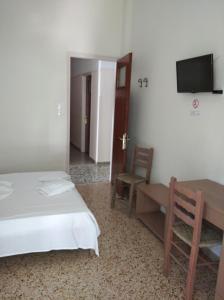 TV a/nebo společenská místnost v ubytování Hotel Ion