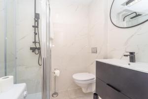 Kúpeľňa v ubytovaní Przytulny Apartament 3city z Dwiema Sypialniami w Gdyni by Noclegi Renters