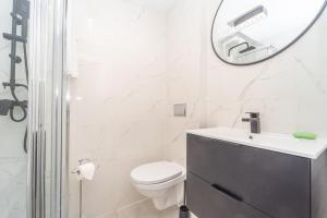Kúpeľňa v ubytovaní Przytulny Apartament 3city z Dwiema Sypialniami w Gdyni by Noclegi Renters