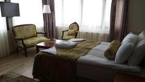 Posezení v ubytování Tashkonak Studio Suites