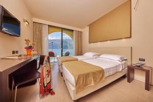 Postel nebo postele na pokoji v ubytování Hotel Europa