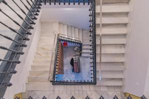 a view of a staircase in a building at Mosaiko Homes Catedral Granada in Granada