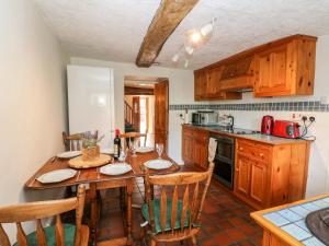 Kjøkken eller kjøkkenkrok på The Cottage