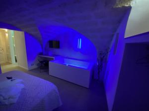 Llit o llits en una habitació de Sogno D'Epoca 1822