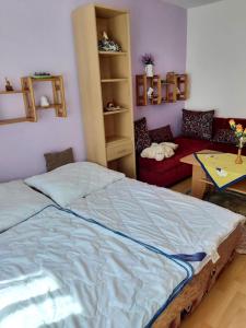 Posteľ alebo postele v izbe v ubytovaní Apartmán Palenica