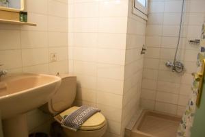 Koupelna v ubytování Egnatia Hotel